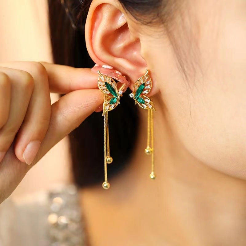 Aretes Mariposa Dorada de la Suerte®