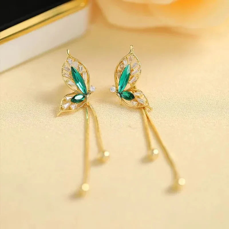 Aretes Mariposa Dorada de la Suerte®